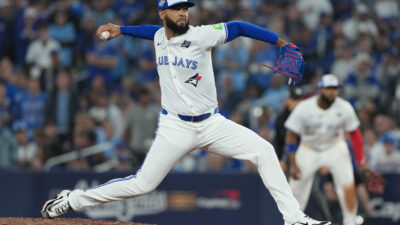 Oct 24, 2025; Toronto, Ontario, CAN; Toronto Blue Jays pitcher Seranthony Dominguez (48) pitches against the Los Angeles Dodgers in the fifth inning during game one of the 2025 MLB World Series at Rogers Centre.