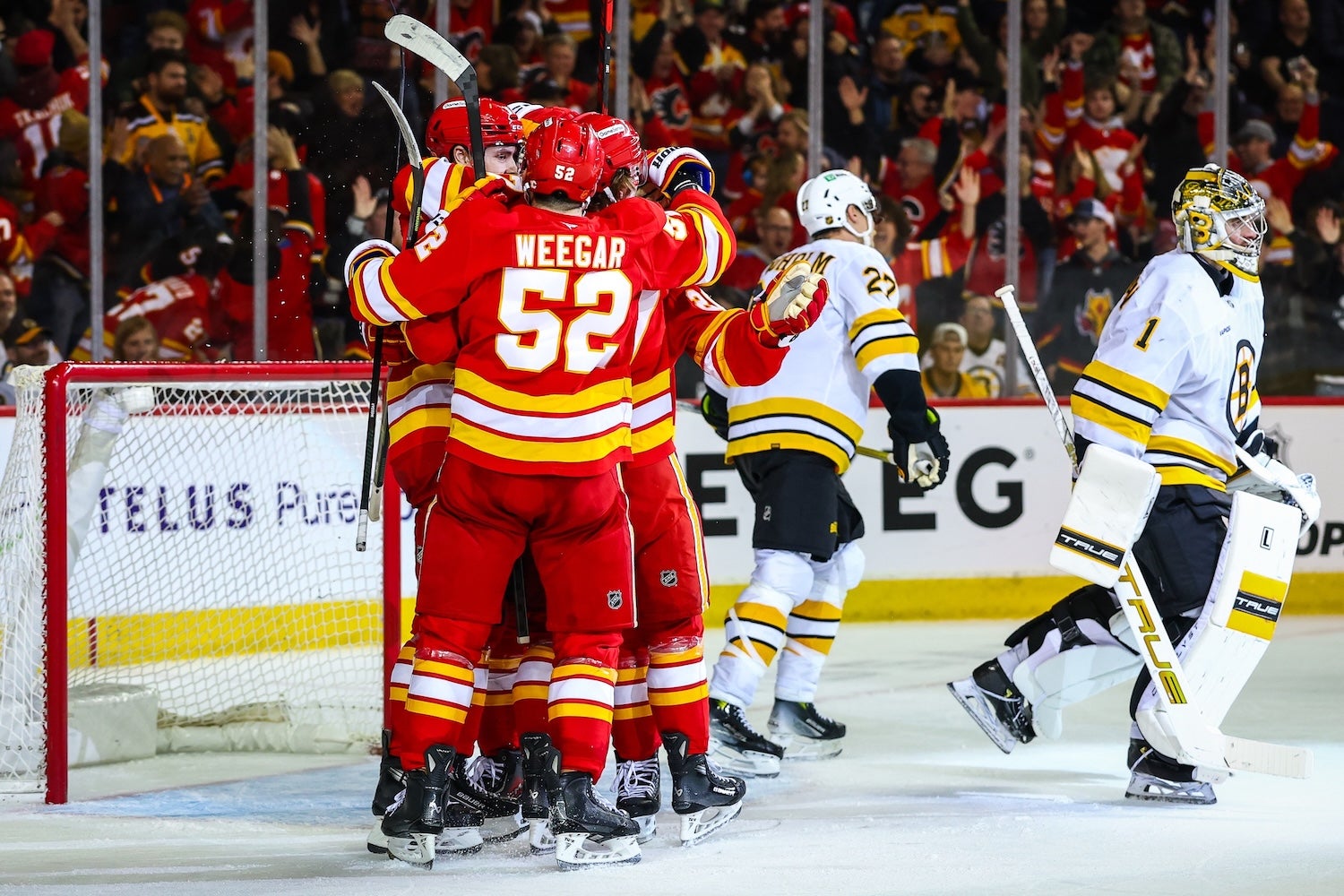 3 Stars: Struggles continue for Bruins in OT loss to Flames - 98.5 The Sports Hub