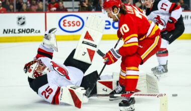 Flames grind out a point against Devils