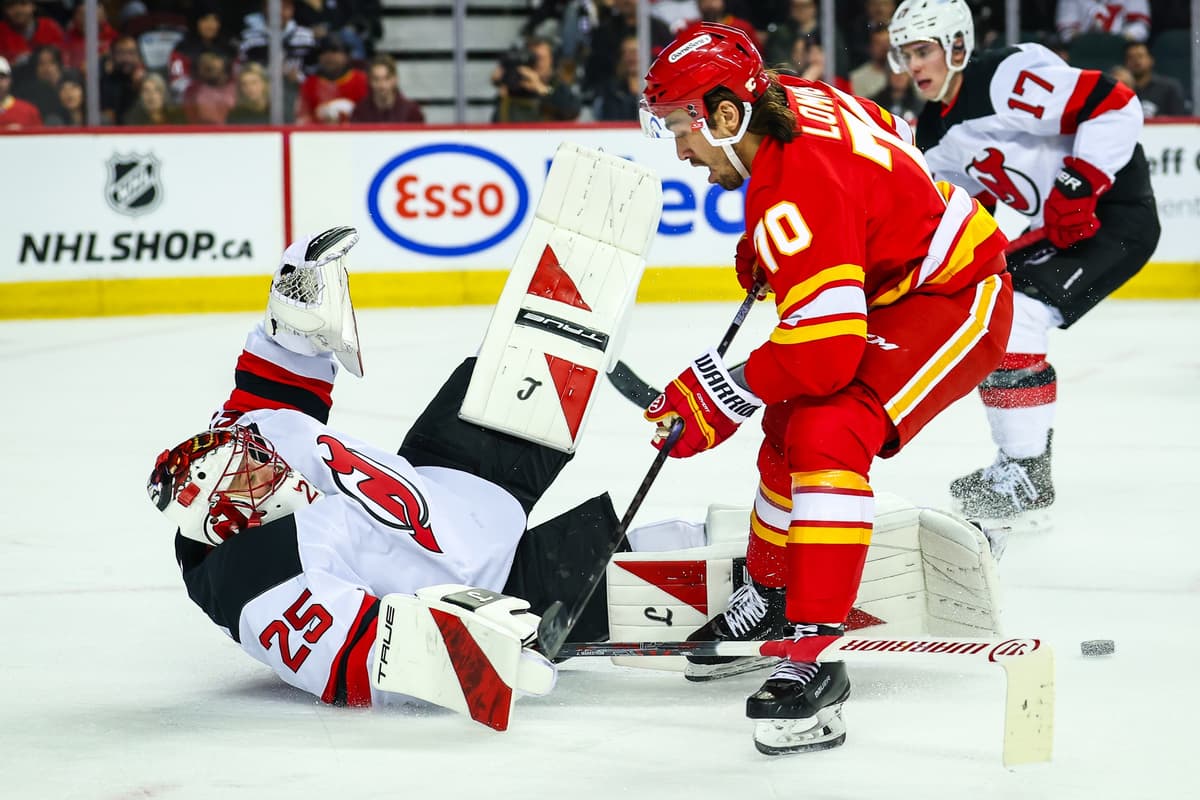 Flames grind out a point against Devils