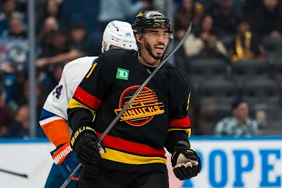 Vancouver Canucks forward Evander Kane celebrates on the ice
