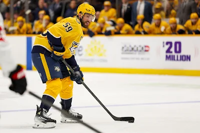 Nashville Predators defenseman Roman Josi handles the puck during 2026 game.