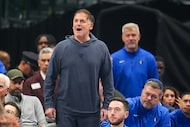 Mark Cuban reacts during the first half of an NBA basketball game between the Dallas...