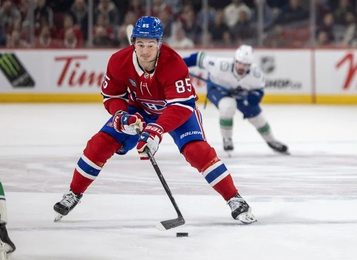  Montreal Canadiens’ Alexandre Texier carries the puck into the Vancouver Canucks’ zone during the first period at the Bell Centre in Montreal on Monday January 12, 2026.