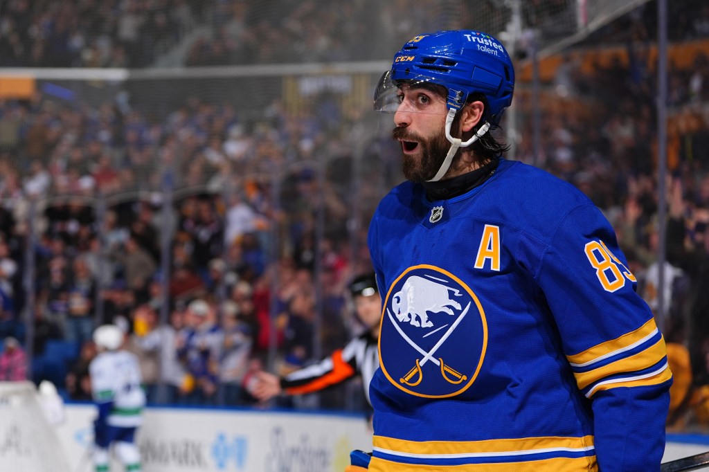 Hockey player Alex Tuch, number 89 for the Buffalo Sabres, celebrates a goal.