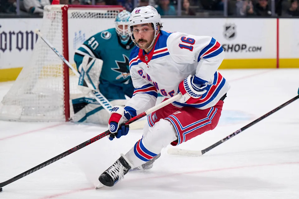 Mar 29, 2025; San Jose, California, USA; New York Rangers center Vincent Trocheck (16) skates with the puck against San Jose Sharks goaltender Alexandar Georgiev (40) during the first period at SAP Center at San Jose.