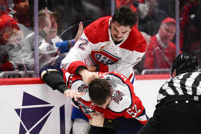 Arber Xhekaj and Dylan McIlrath drop gloves during Montreal Canadiens Washington Capitals NHL match