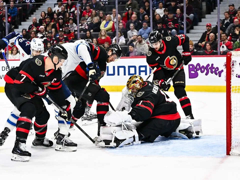  Senators goaltender Leevi Meriläinen makes a save during the first period against the Jets.