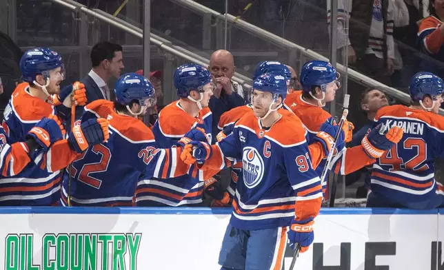 Edmonton Oilers' Connor McDavid (97) celebrates a goal against the Nashville Predators during first period NHL action, in Edmonton on Tuesday, Jan. 6, 2026. (Jason Franson/The Canadian Press via AP)