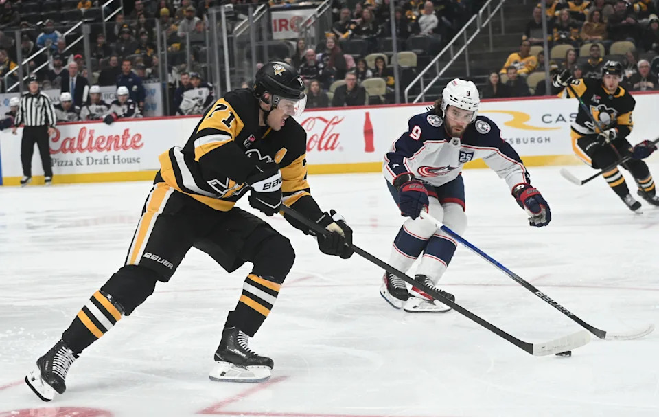 Jan 17, 2026; Pittsburgh, Pennsylvania, USA; Pittsburgh Penguins center Evgeni Malkin (71) skates near Columbus Blue Jackets Ivan Provorov (9) during the first period at PPG Paints Arena. Mandatory Credit: Philip G. Pavely-Imagn Images