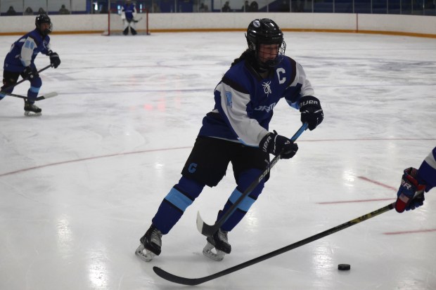 Deirdre McKiernan, a senior on the East Catholic co-op ice hockey team, comes from an ice hockey family but she will be playing field hockey in college next year. (Photo courtesy of Brendan McKiernan).