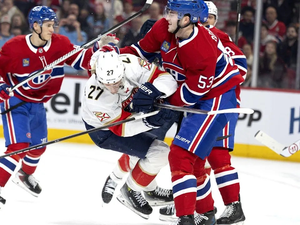  Canadiens defenceman Noah Dobson (53) sends Florida Panthers centre Eetu Luostarinen (27) to the ice after Luostarinen in Montreal on Thursday, Jan. 8, 2026.