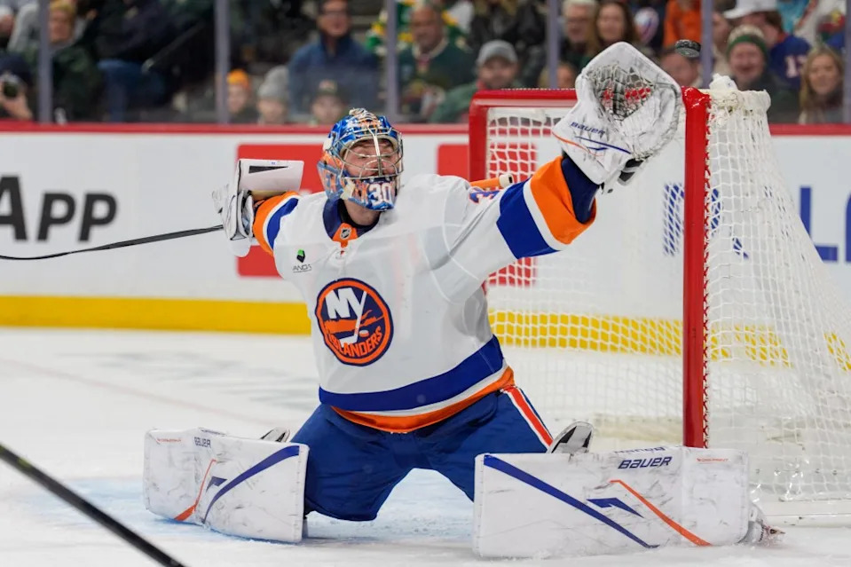 Ilya Sorokin (30) reaches for the puck on a shot during the second period of the Islanders’ win over the Wild. IMAGN IMAGES via Reuters Connect