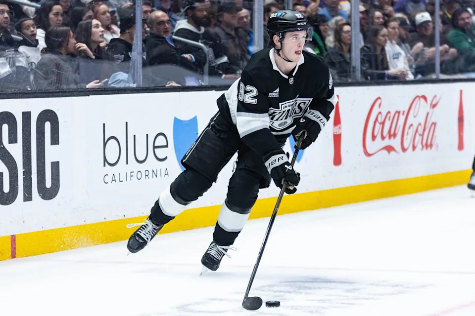 Los Angeles Kings left wing Brandt Clarke (92) clears the puck during an NHL match against the Vegas Golden Knights on January 14, 2025 in Los Angeles, Calif.