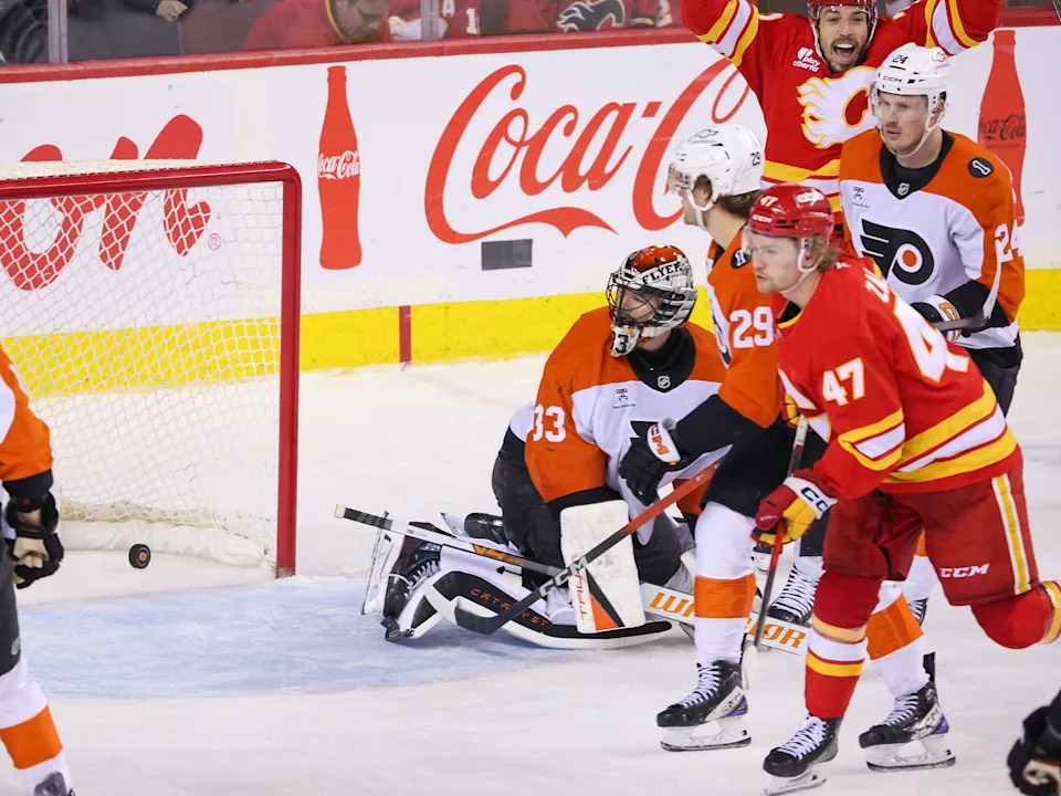  Calgary Flames forward Connor Zary’s shot goes past Philadelphia Flyers goaltender Samuel Ersson at the Scotiabank Saddledome in Calgary on Wednesday December 31, 2025.Gavin Young/Postmedia