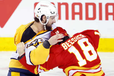 John Beecher suspended as Calgary Flames await fallout after Michael McCarron incident