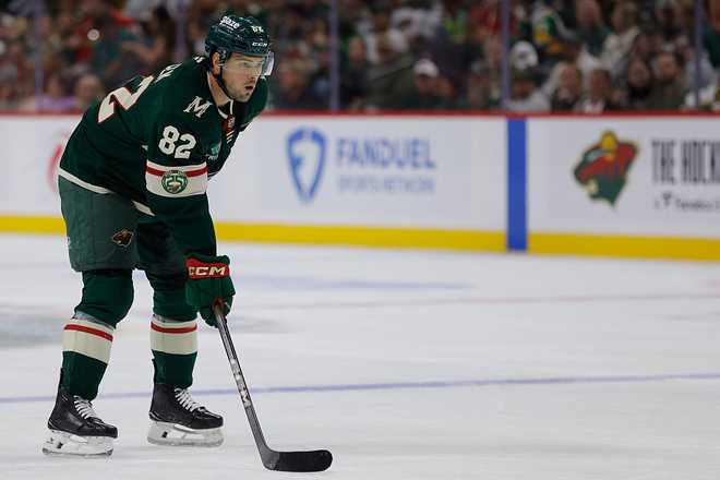 NHL: SEP 28 Preseason Blackhawks at Wild SAINT PAUL, MN - SEPTEMBER 28: Minnesota Wild defenseman David Spacek (82) lines up for a face-off during the NHL preseason game between the Chicago Blackhawks and Minnesota Wild on September 28th, 2025, at Grand Casino Arena in St. Paul, MN. (Photo by Bailey Hillesheim/Icon Sportswire via Getty Images)