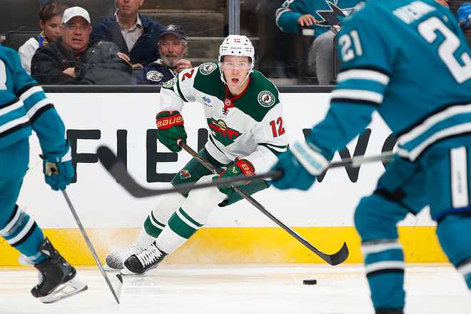 NHL: DEC 31 Wild at Sharks SAN JOSE, CA - DECEMBER 31: Minnesota Wild left wing Matt Boldy (12) looks to pass the puck during the NHL game between the Minnesota Wild and the San Jose Sharks on December 31, 2025 at SAP Center in San Jose, CA. (Photo by Scott Dinn/Icon Sportswire via Getty Images)