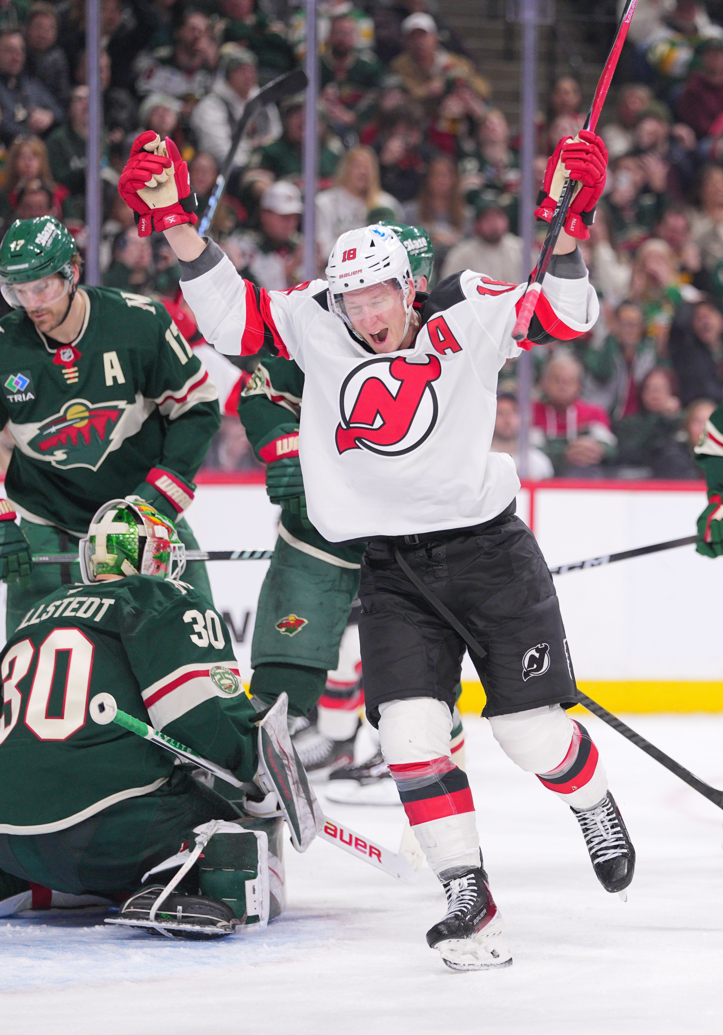 ST PAUL, MINNESOTA - JANUARY 12: Ondrej Palat #18 of the New Jersey Devils celebrates his goal against Jesper Wallstedt #30 of the Minnesota Wild in the second period at Grand Casino Arena on January 12, 2026 in St Paul, Minnesota. (Photo by Brad Rempel/Getty Images)