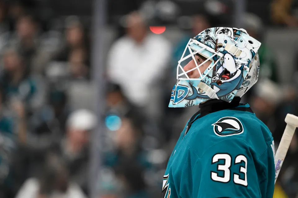Goaltender Alex Nedeljkovic #33 of the San Jose Sharks looks on in the first period against the Dallas Stars at SAP Center on January 10, 2026 in San Jose, California. 