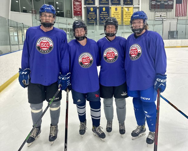 Deirdre McKiernan (third from left) is the youngest of the McKiernan siblings to play ice hockey but she has broken from her family tradition and will be playing field hockey in college. From left to right, Patrick, Kate, Deirdre and Mary McKiernan. (Photo courtesy of Brendan McKiernan)