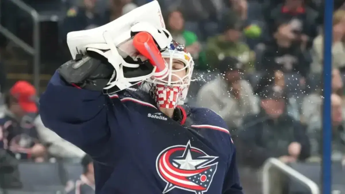 Elvis Merzlikins’ Unusual In-Game Water Break Catches Attention at Blue Jackets Match