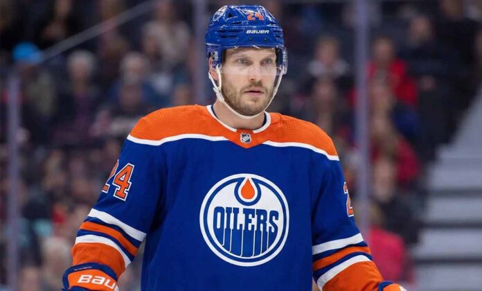 Concept images showing defenseman Jamie Oleksiak wearing Edmonton Oilers home jersey, illustrating a potential trade scenario.