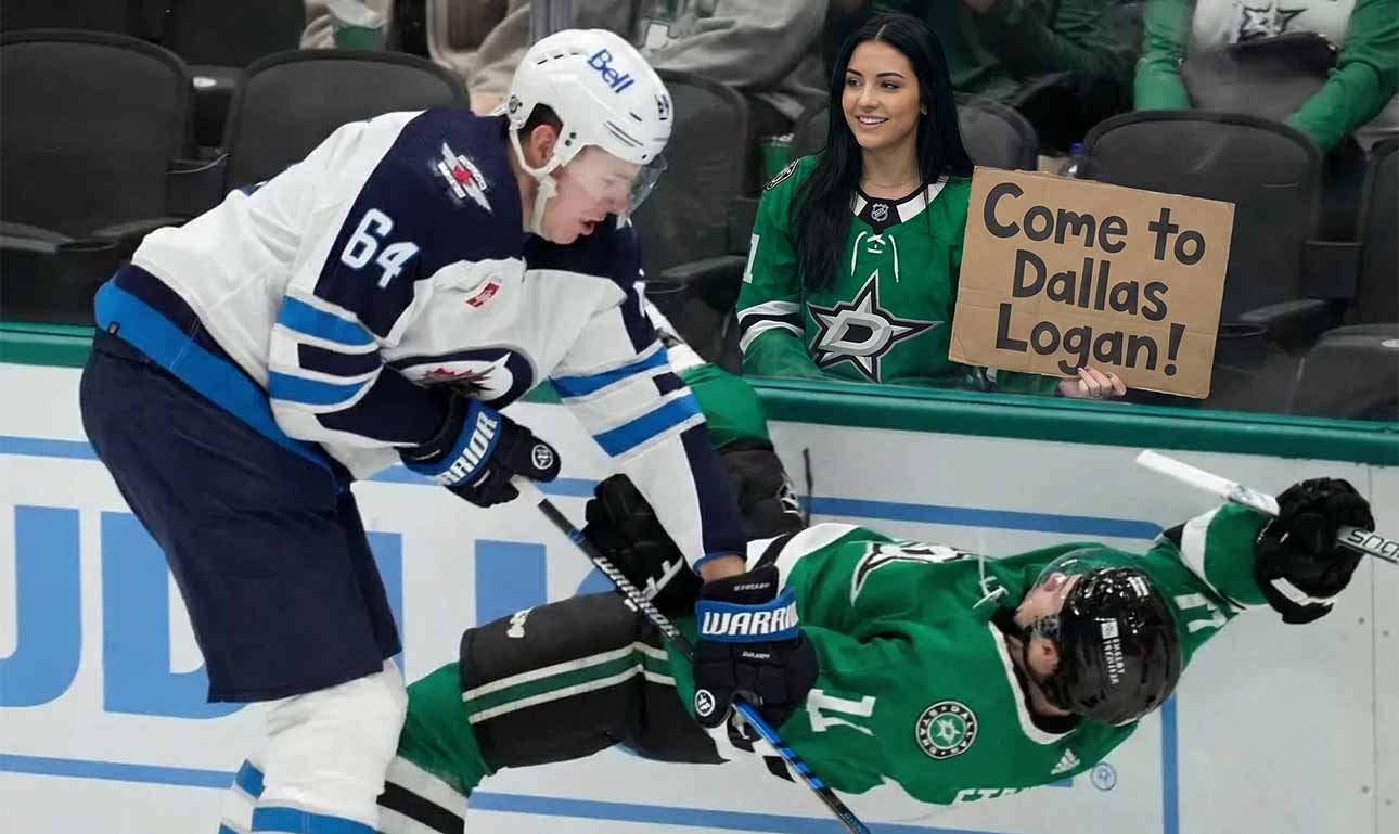 A smiling female Dallas Stars fan in the stands holds a cardboard sign reading "Come to Dallas Logan!" while Winnipeg Jets defenseman Logan Stanley checks a Stars player into the boards just in front of her behind the glass.
