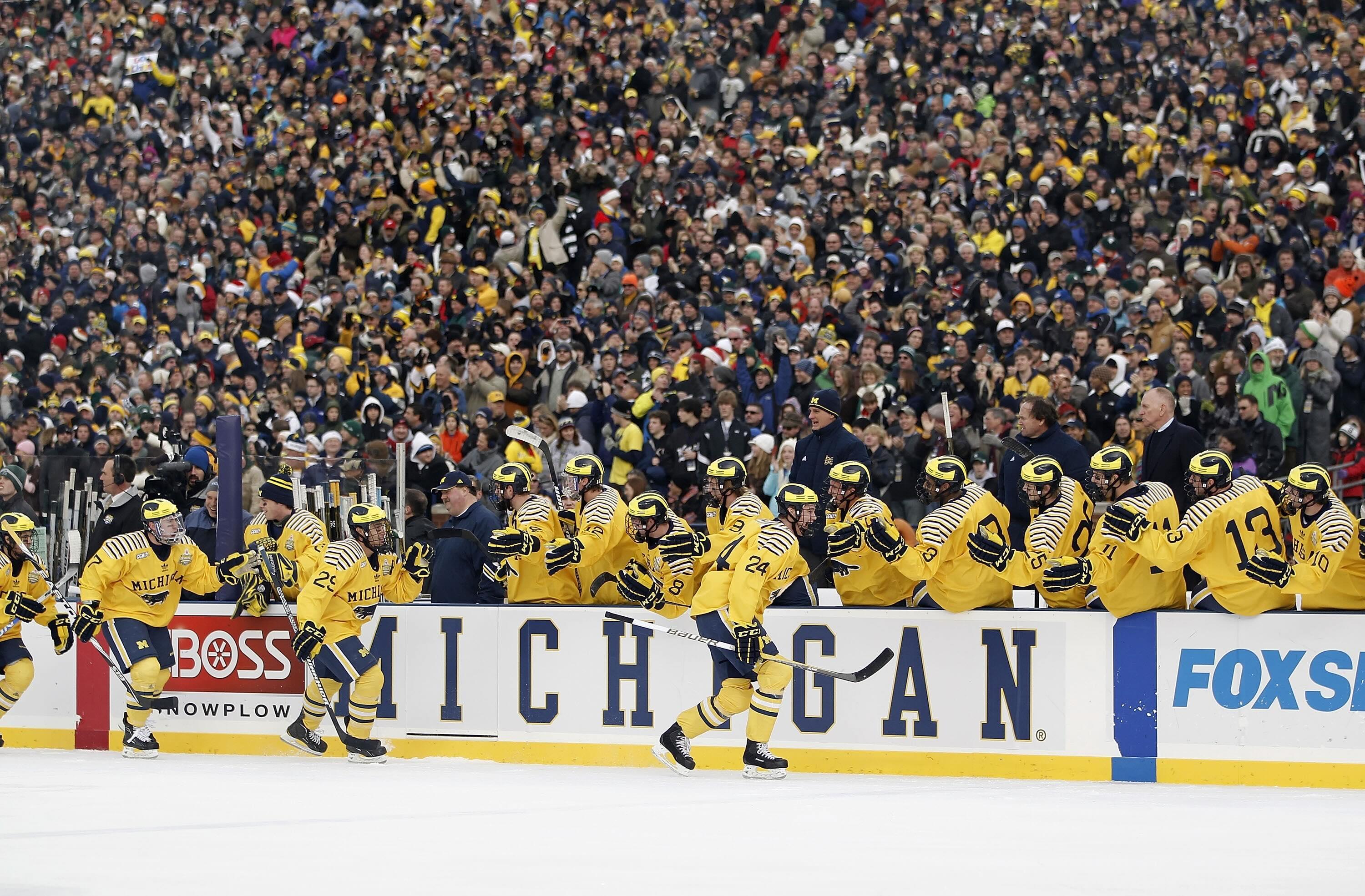 The Michigan Wolverines celebrate a goal in the Big Chill game against Michigan State in 2010