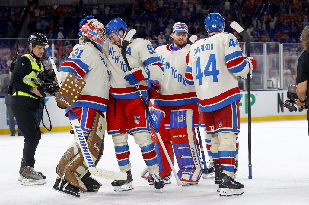 New York Rangers celebrate their 5-1 victory against the Florida Panthers during the 2026 Discover NHL Winter Classic at LoanDepot Park on January 2, 2026 in Miami, Florida. 