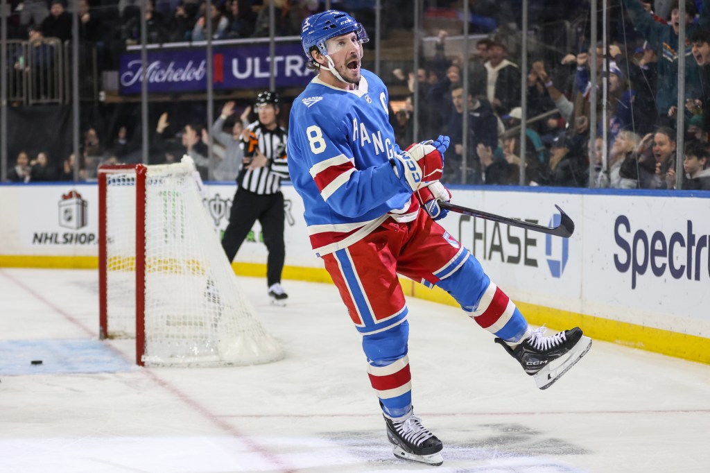 New York Rangers center J.T. Miller (8) celebrates after scoring a goal against the Montréal Canadiens at Madison Square Garden.