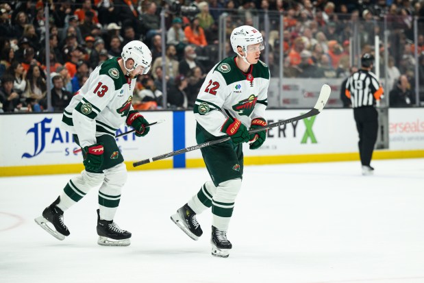 Minnesota Wild right wing Danila Yurov, right, skates off after scoring during the second period of an NHL hockey game against the Anaheim Ducks, Friday, Jan. 2, 2026, in Anaheim, Calif. (AP Photo/William Liang)