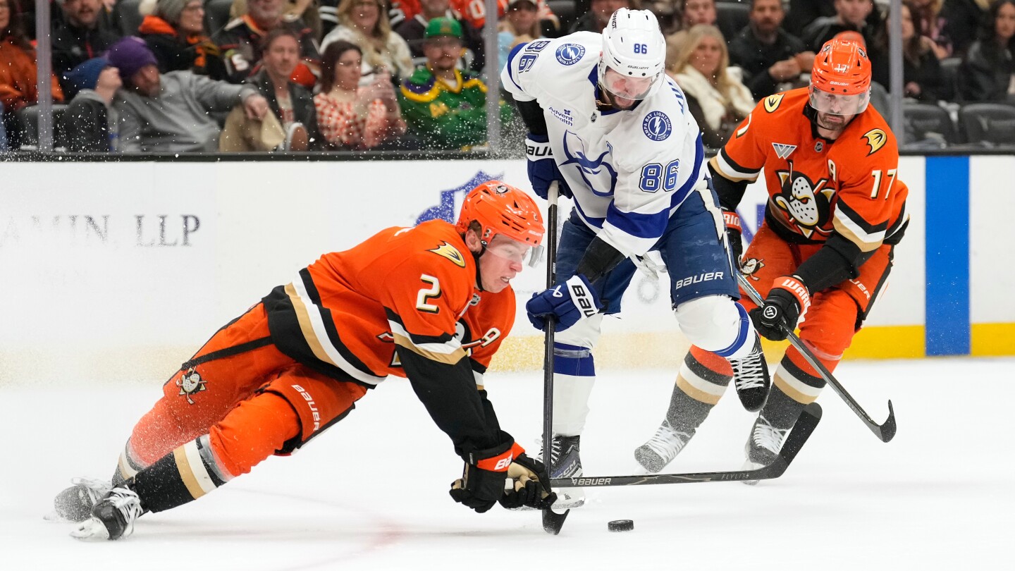 Darren Raddysh's OT goal sends Lightning past Ducks 4-3 in coach Cooper's 1,000th game