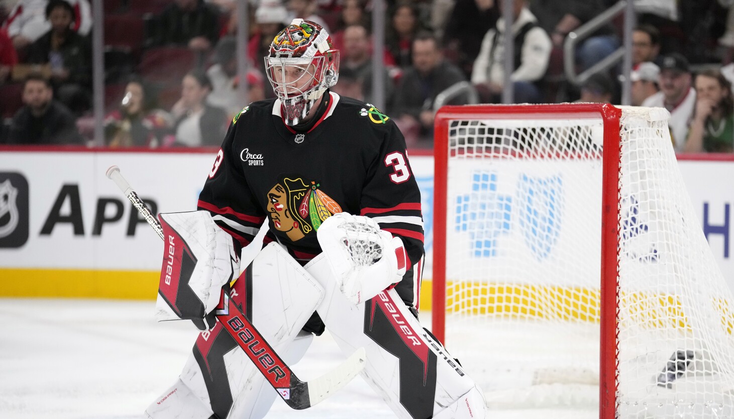 Blackhawks goalie Drew Commesso earns first NHL win in spectacular fashion