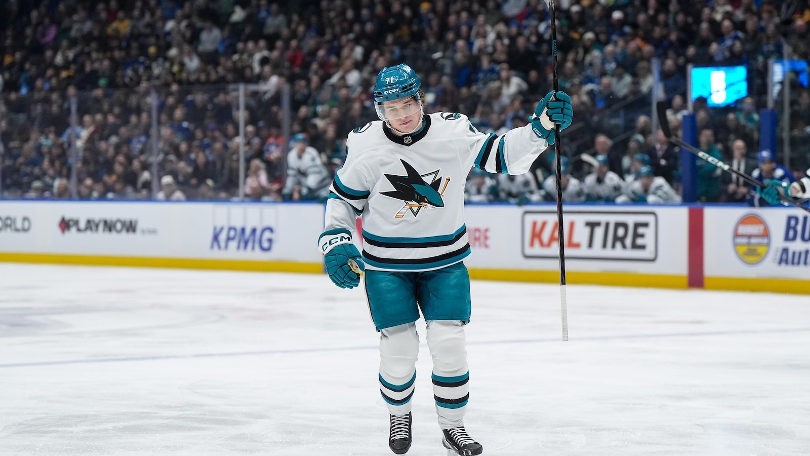 Celebrini's 4 points lead Sharks to 5-2 win over Canucks
