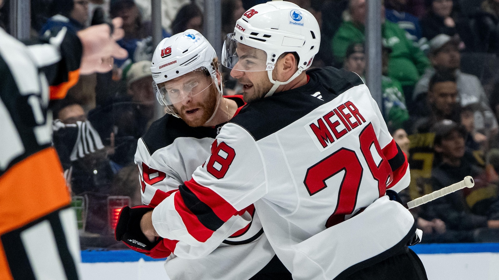 Cody Glass has 2 goals and an assist in Devils' 5-4 win over Canucks