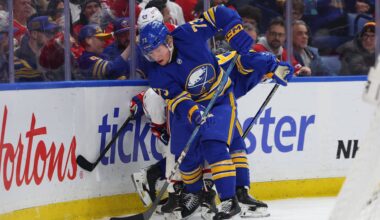 Jan 31, 2026; Buffalo, New York, USA;  Buffalo Sabres defenseman Zach Metsa (73) clears the puck from behind the net during the first period against the Montréal Canadiens at KeyBank Center. Mandatory Credit: Timothy T. Ludwig-Imagn Images