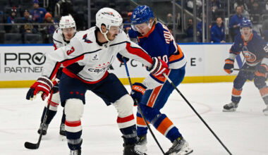 Nov 30, 2025; Elmont, New York, USA;  Washington Capitals defenseman Matt Roy (3) blocks the shot by New York Islanders right wing Simon Holmstrom (10) during the second period at UBS Arena. Mandatory Credit: Dennis Schneidler-Imagn Images