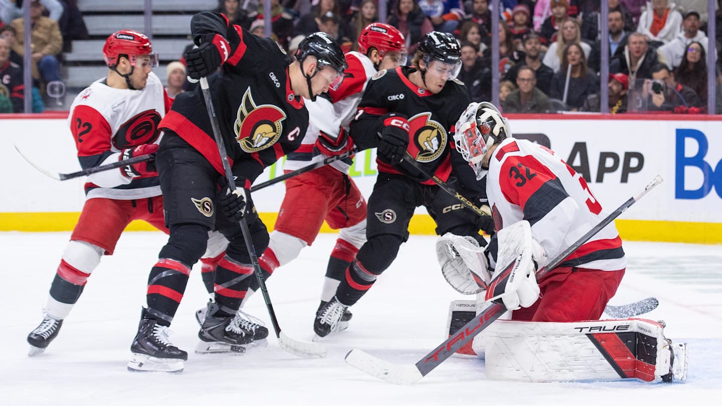 Jan 24, 2026; Ottawa, Ontario, CAN; Ottawa Senators left wing Brady Tkachuk (7) is unable to capitalize on a loose puck in front of Carolina Hurricanes goalie Brandon Bussi (32) in the first period at the Canadian Tire Centre. Mandatory Credit: Marc DesRosiers-IMAGN Images
