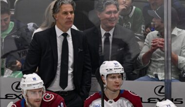 May 3, 2025; Dallas, Texas, USA; Colorado Avalanche head coach Jared Bednar and a fan dressed as Bednar look on during the second period against the Dallas Stars in game seven of the first round of the 2025 Stanley Cup Playoffs at American Airlines Center. Mandatory Credit: Jerome Miron-Imagn Images