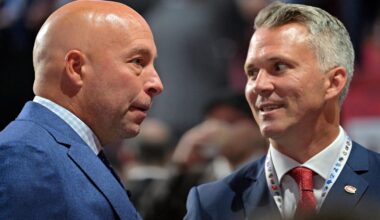 Jul 7, 2022; Montreal, Quebec, CANADA; Montreal Canadiens general manager Kent Hughes (left) talks with head coach Martin St. Louis before the first round of the 2022 NHL Draft at Bell Centre. Mandatory Credit: Eric Bolte-Imagn Images