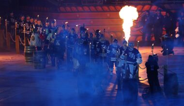 Feb 1, 2026; Tampa Bay, Florida, USA; The Tampa Bay Lightning make their entrance to the ice in the 2026 Stadium Series ice hockey game against the Boston Bruins at Raymond James Stadium. Mandatory Credit: Nathan Ray Seebeck-Imagn Images