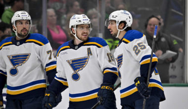 Dec 14, 2024; Dallas, Texas, USA; St. Louis Blues defenseman Justin Faulk (72) and center Robert Thomas (18) and center Jordan Kyrou (25) in action during the game between the Dallas Stars and the St. Louis Blues at American Airlines Center. Mandatory Credit: Jerome Miron-Imagn Images