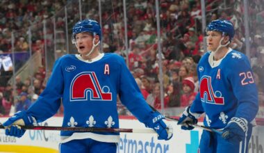 Jan 3, 2026; Raleigh, North Carolina, USA; Colorado Avalanche defenseman Cale Makar (8) and center Nathan MacKinnon (29) look on during the third period against the Carolina Hurricanes at Lenovo Center. Mandatory Credit: James Guillory-Imagn Images