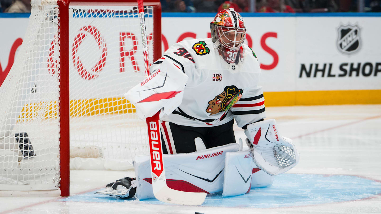 Nov 5, 2025; Vancouver, British Columbia, CAN; Chicago Blackhawks goalie Spencer Knight (30) makes a save against the Vancouver Canucks in the second period at Rogers Arena. Mandatory Credit: Bob Frid-Imagn Images