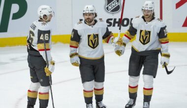 Jan 25, 2026; Ottawa, Ontario, CAN; Vegas Golden Knights defenseman Rasmus Anderssson (4 - center) celebrates with right wing Jonas Rondbjerg (46) and defenseman Noah Hanifin (15) his goal scored in the third period against the Ottawa Senators at the Canadian Tire Centre. Mandatory Credit: Marc DesRosiers-IMAGN Images