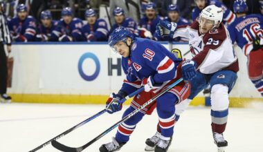 Dec 6, 2025; New York, New York, USA;  New York Rangers left wing Artemi Panarin (10) and Colorado Avalanche center Nathan MacKinnon (29) battle for control of the puck in the second period at Madison Square Garden. Mandatory Credit: Wendell Cruz-Imagn Images