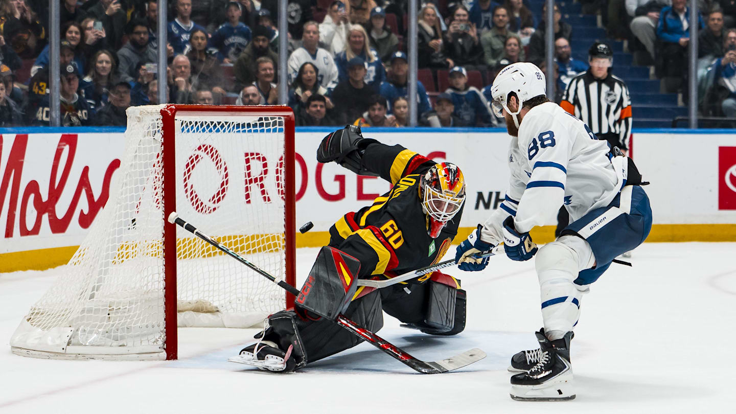 Jan 31, 2026; Vancouver, British Columbia, CAN; Toronto Maple Leafs forward William Nylander (88) scores on Vancouver Canucks goalie Nikita Tolopilo (60) during the shootout at Rogers Arena. Mandatory Credit: Bob Frid-Imagn Images
