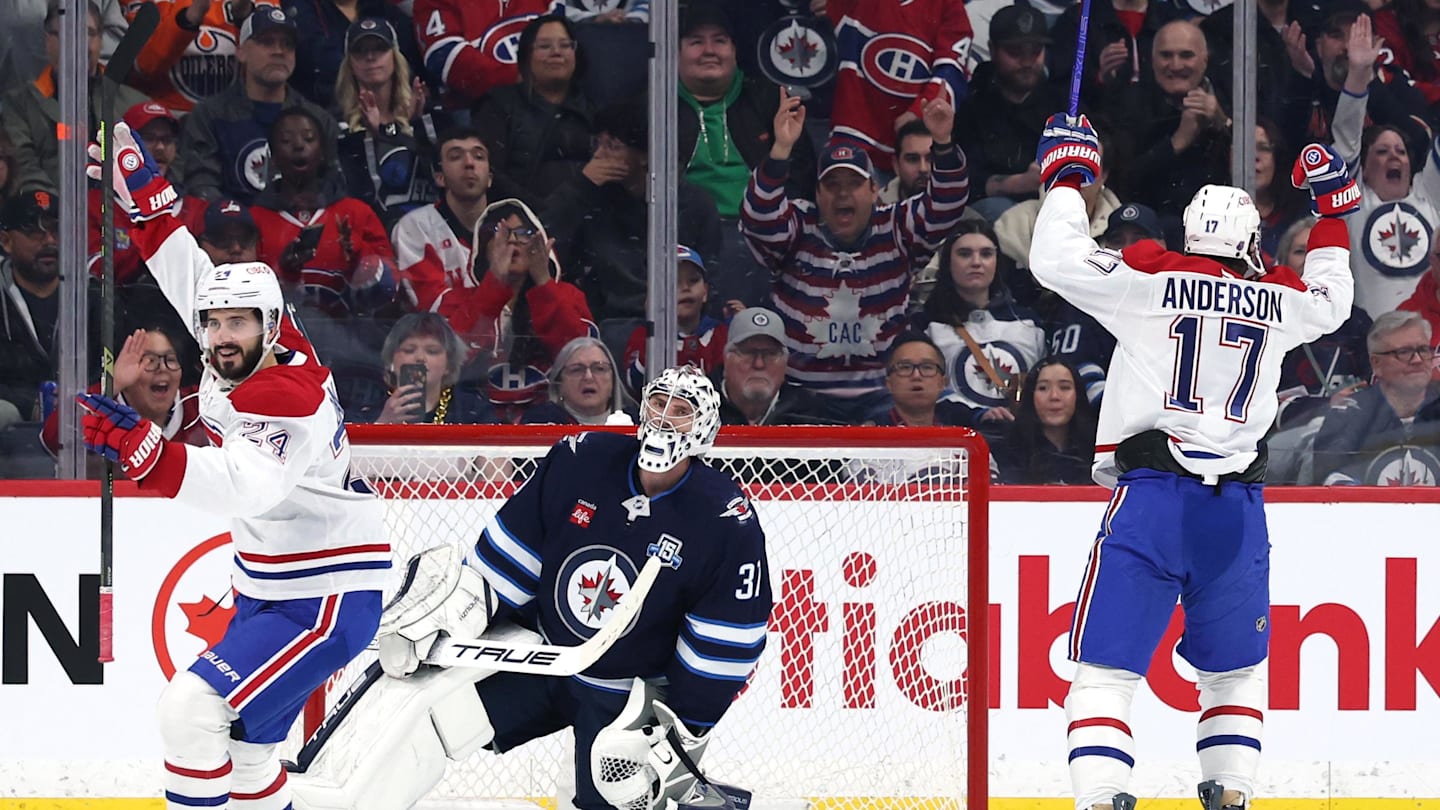 Montreal Canadiens right wing Josh Anderson (17) celebrates a goal against Winnipeg Jets goaltender Connor Hellebuyck (37) in the second period at Canada Life Centre.