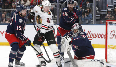Blue Jackets goaltender Jet Greaves makes a save through traffic.